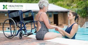 Why you should consider Hydrotherapy for Arthritis Management 5 exercise physiologist giving support for arthritis patient