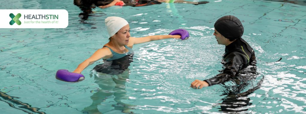 Hydrotherapy at Healthstin Sans Souci 19 Healthsin Physio assisting pool exercises for spinal cord injury patients' treatment