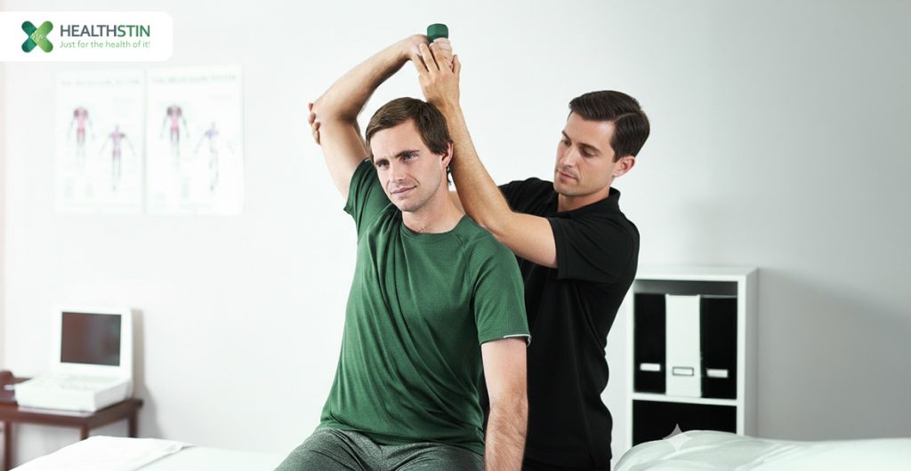 Guide to DVA-Funded Wellbeing: How to Start Your Exercise Program for Veterans 2 Assisted stretching exercise in therapy session.