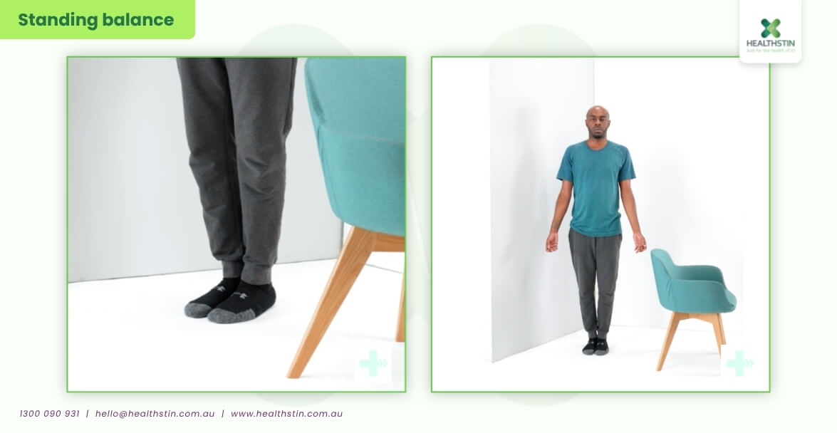 7 Best Exercises for Stroke Patients (Safe & Effective Recovery Guide) 22 Stroke patient performing standing balance exercises beside a chair to improve stability, posture, coordination, and fall prevention during stroke rehabilitation therapy at Healthstin.