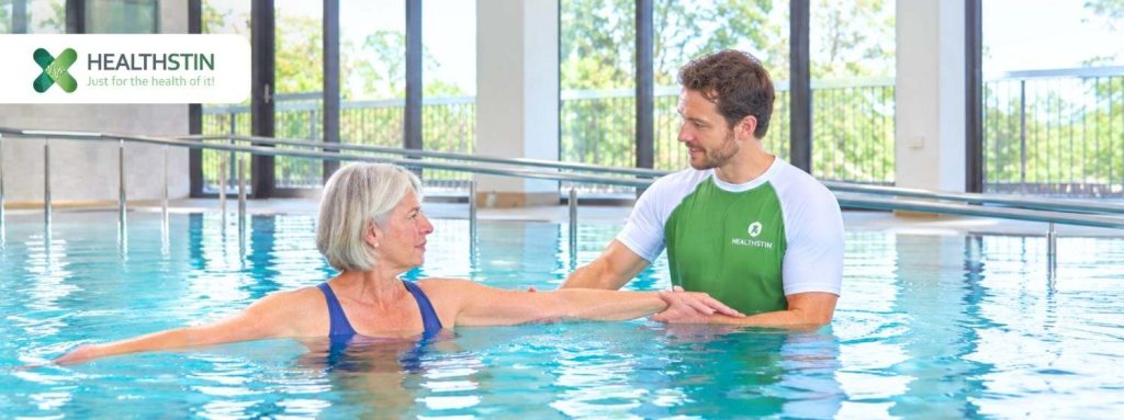 Hydrotherapy at Healthstin Sans Souci 17 Physiotherapist guiding an injured worker through a hydrotherapy session in a heated pool. Infographic